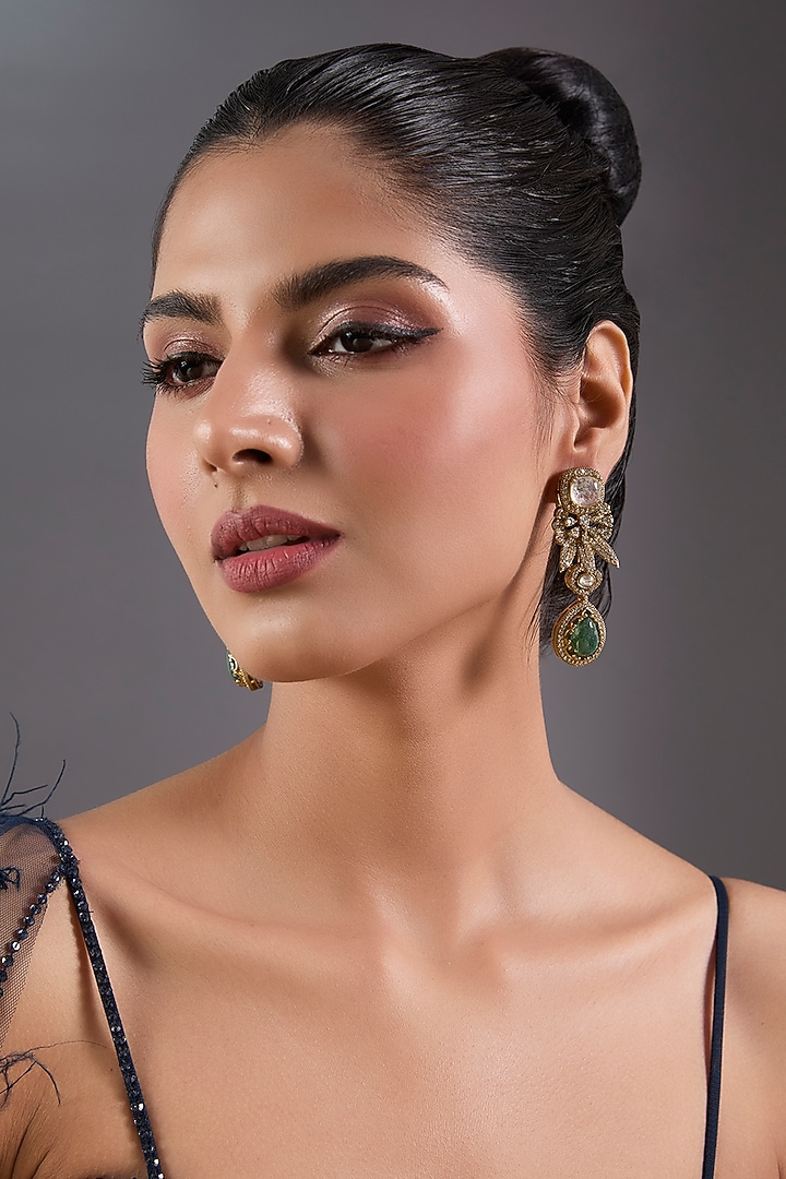 Gold Finish Zircon & Emerald Stone Dangler Earrings by Moh-Maya by Disha Khatri at Pernia's Pop Up Shop