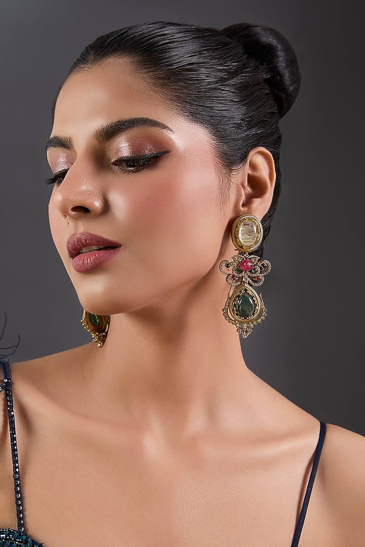Gold Finish Zircon & Emerald Stone Dangler Earrings by Moh-Maya by Disha Khatri at Pernia's Pop Up Shop