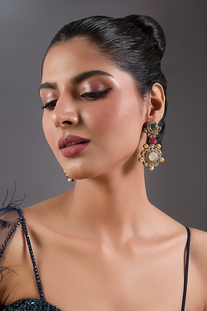 Gold Finish Zircon & Emerald Stone Dangler Earrings by Moh-Maya by Disha Khatri at Pernia's Pop Up Shop
