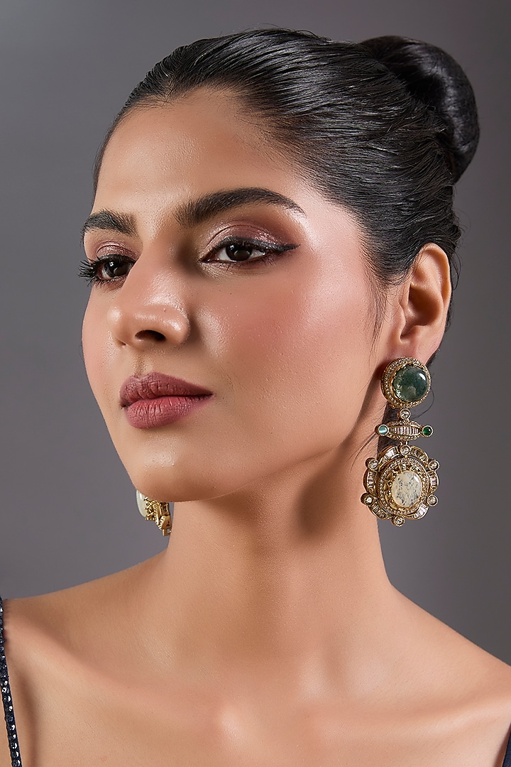Gold Finish Zircon & Emerald Stone Dangler Earrings by Moh-Maya by Disha Khatri at Pernia's Pop Up Shop