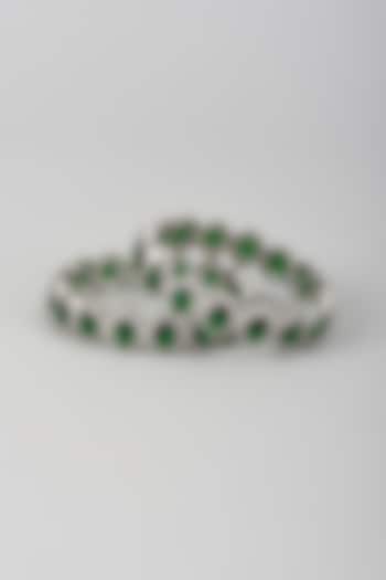 Silver Finish Zircon & Emerald Stone Bangles (Set Of 2) by Moh-Maya by Disha Khatri at Pernia's Pop Up Shop