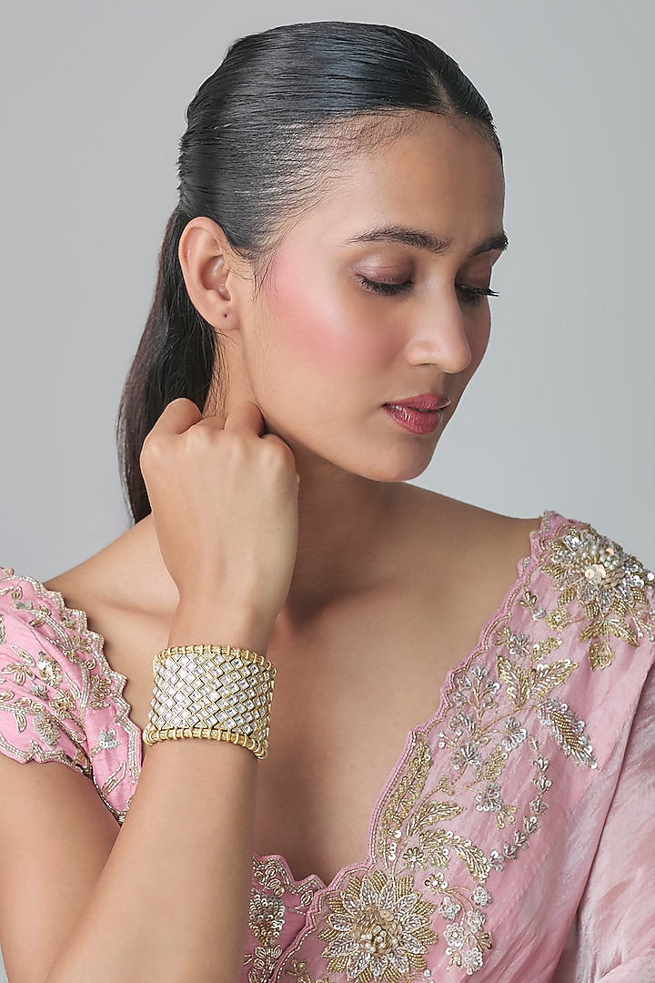Gold Finish Kundan Polki Bracelet by Moh-Maya by Disha Khatri at Pernia's Pop Up Shop