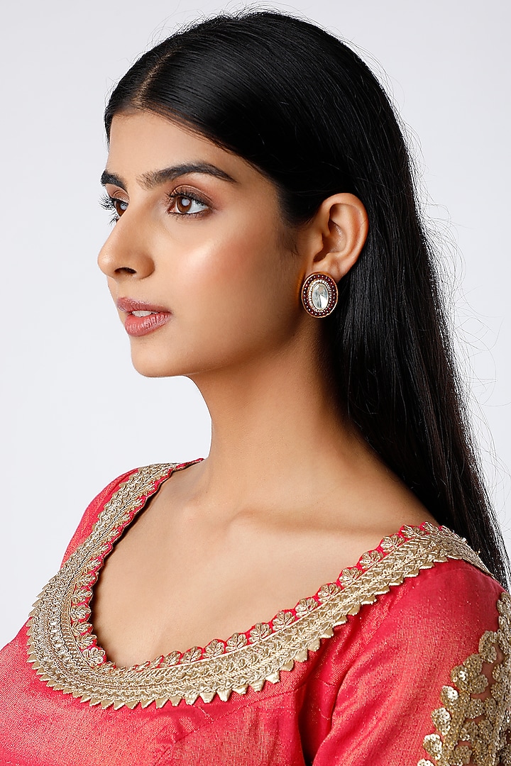 Gold Finish Faux Diamonds Stud Earrings by Moh-Maya by Disha Khatri