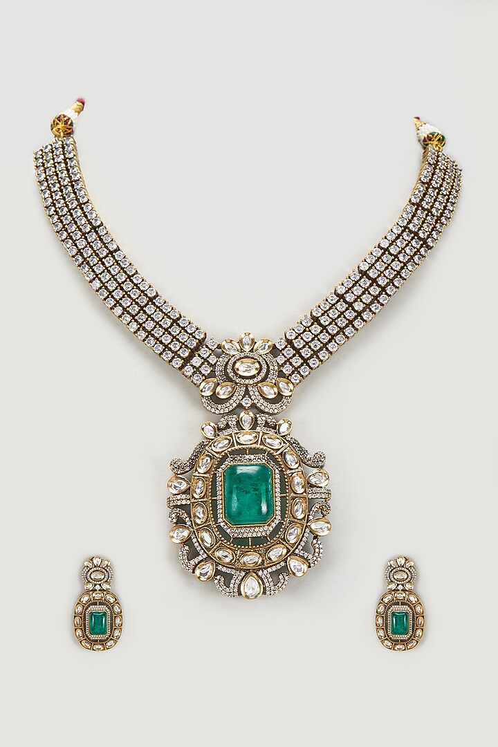Black Rhodium Finish Zircon & Long Emerald Stone Necklace Set by Moh-Maya by Disha Khatri at Pernia's Pop Up Shop