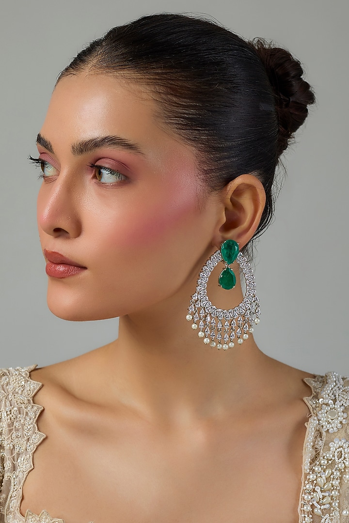 White Gold Finish Zircon & Emerald Stone Dangler Earrings by Moh-Maya by Disha Khatri at Pernia's Pop Up Shop
