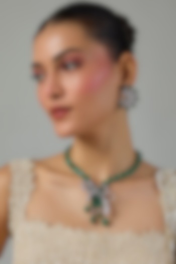 White Gold Finish Zircon & Emerald Stone Necklace Set by Moh-Maya by Disha Khatri at Pernia's Pop Up Shop