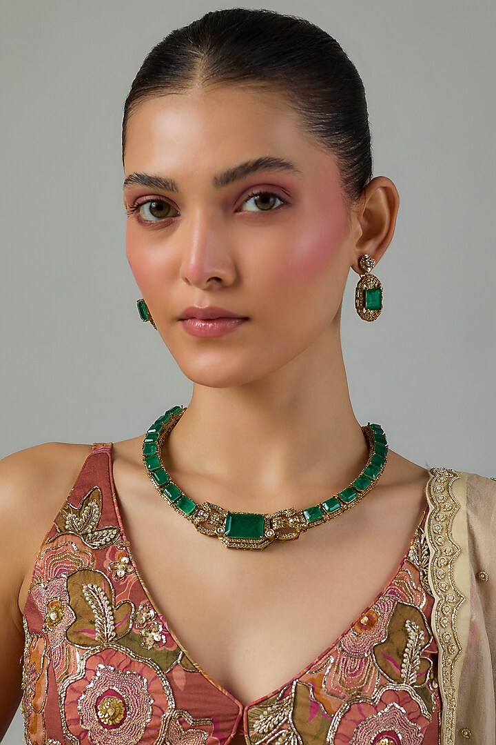 Gold Finish Kundan Polki & Emerald Stone Choker Necklace Set by Moh-Maya by Disha Khatri at Pernia's Pop Up Shop
