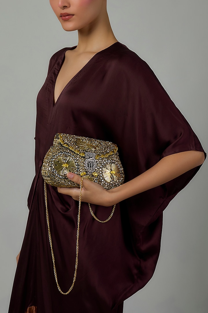 Matte Gold Finish Elephant Motif Clutch by Moh-Maya by Disha Khatri at Pernia's Pop Up Shop
