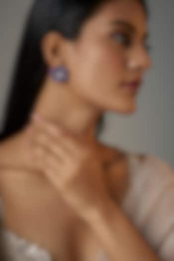 White Finish Dark Purple Zircon Floral Stud Earrings by Moh-Maya by Disha Khatri at Pernia's Pop Up Shop