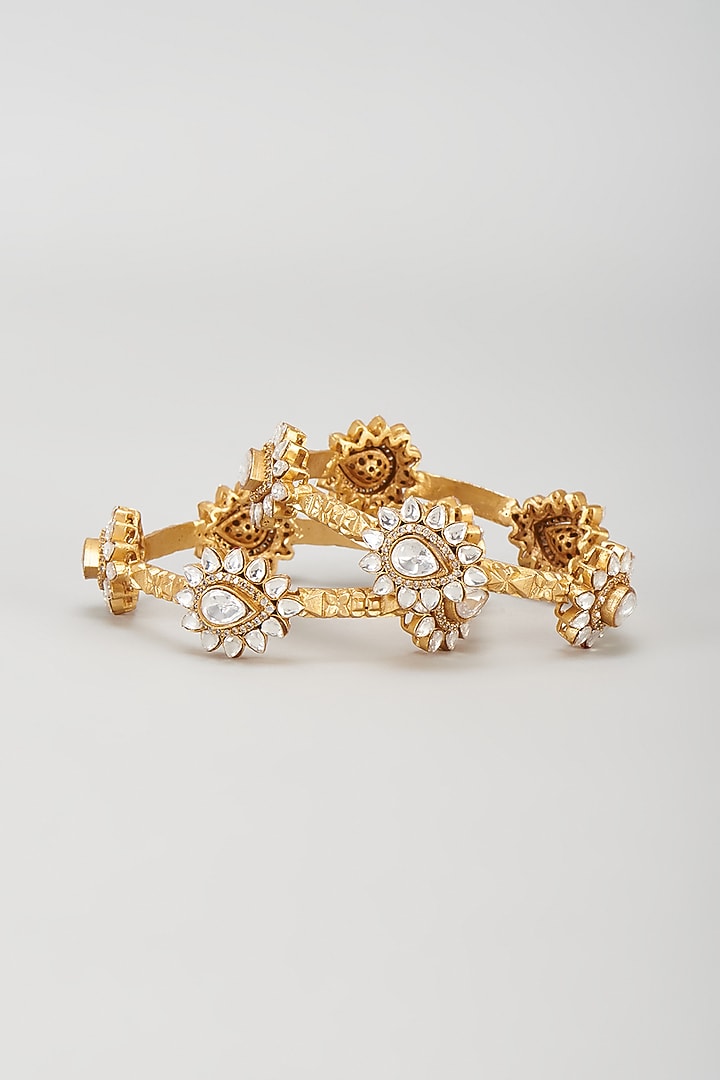 Gold Finish Kundan Polki Oval Kadas (Set Of 2) by Moh-Maya by Disha Khatri at Pernia's Pop Up Shop