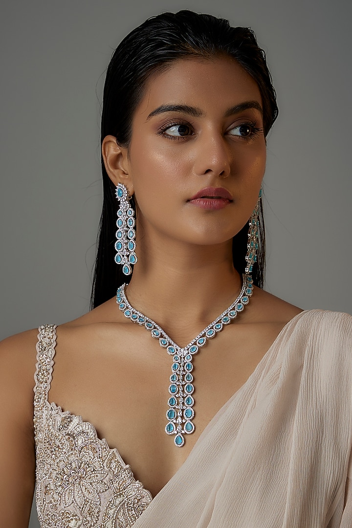 White Finish Light Blue Stone & Zircon Long Necklace Set by Moh-Maya by Disha Khatri at Pernia's Pop Up Shop