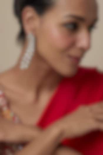 Gold Finish Zircon & Emerald Stone Dangler Earrings by Moh-Maya by Disha Khatri at Pernia's Pop Up Shop