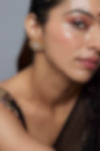 Gold Finish Moissanite & Zircon Stud Earrings by Moh-Maya by Disha Khatri at Pernia's Pop Up Shop