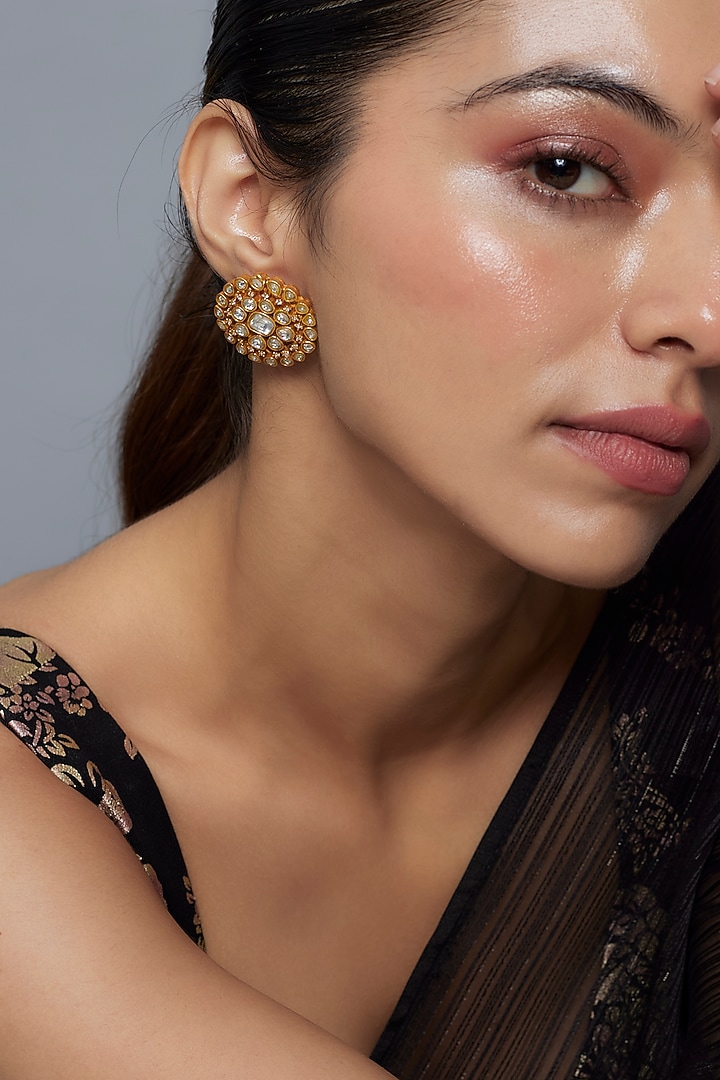 Gold Finish Moissanite & Zircon Stud Earrings by Moh-Maya by Disha Khatri at Pernia's Pop Up Shop