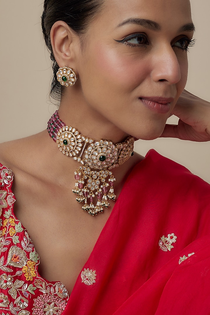 Gold Finish Kundan Polki & Emerald Choker Necklace Set by Moh-Maya by Disha Khatri at Pernia's Pop Up Shop