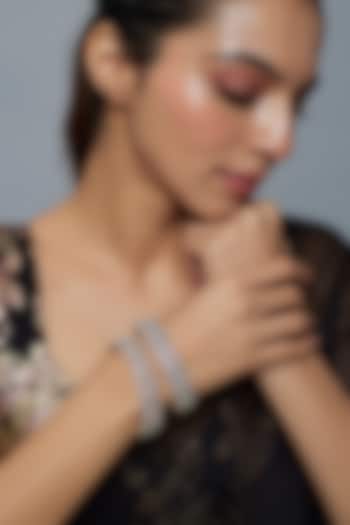 Gold Finish Moissanite & Zircon Bangles (Set Of 2) by Moh-Maya by Disha Khatri at Pernia's Pop Up Shop