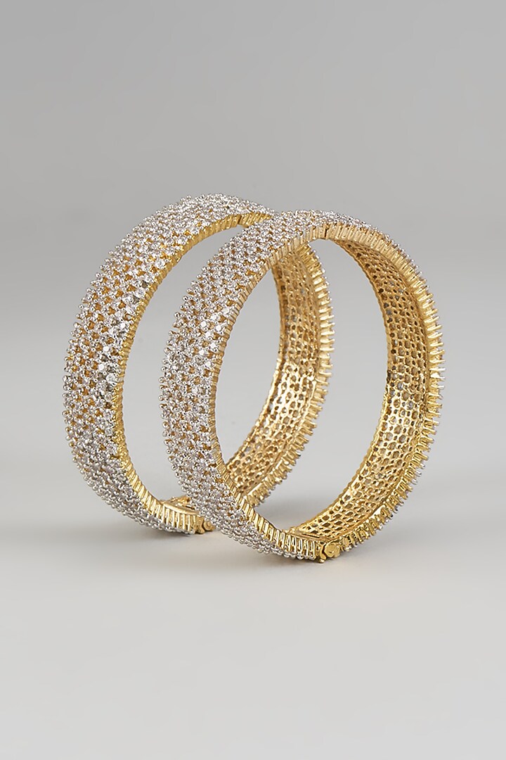 Gold Finish Moissanite & Zircon Bangles (Set Of 2) by Moh-Maya by Disha Khatri at Pernia's Pop Up Shop