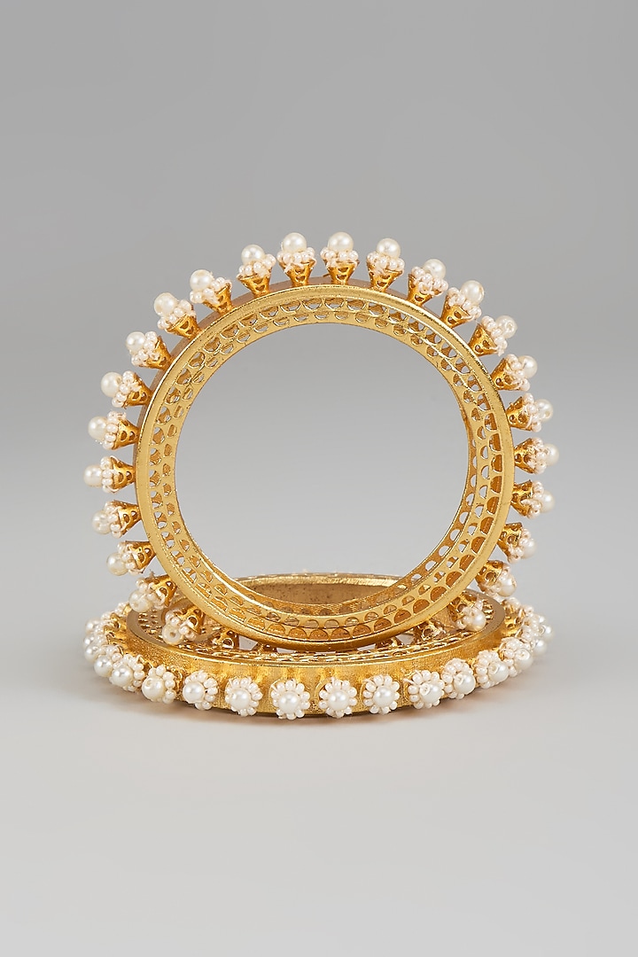 Gold Finish Pearl Bangles (Set Of 2) by Moh-Maya by Disha Khatri at Pernia's Pop Up Shop