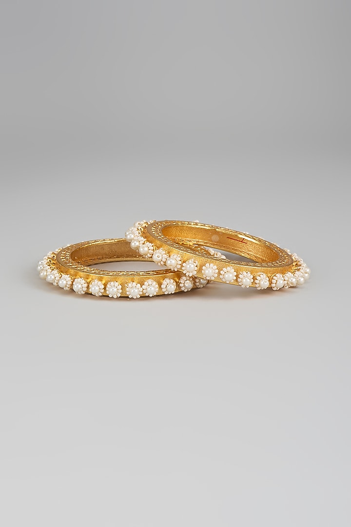 Gold Finish Pearl Bangles (Set Of 2) by Moh-Maya by Disha Khatri at Pernia's Pop Up Shop