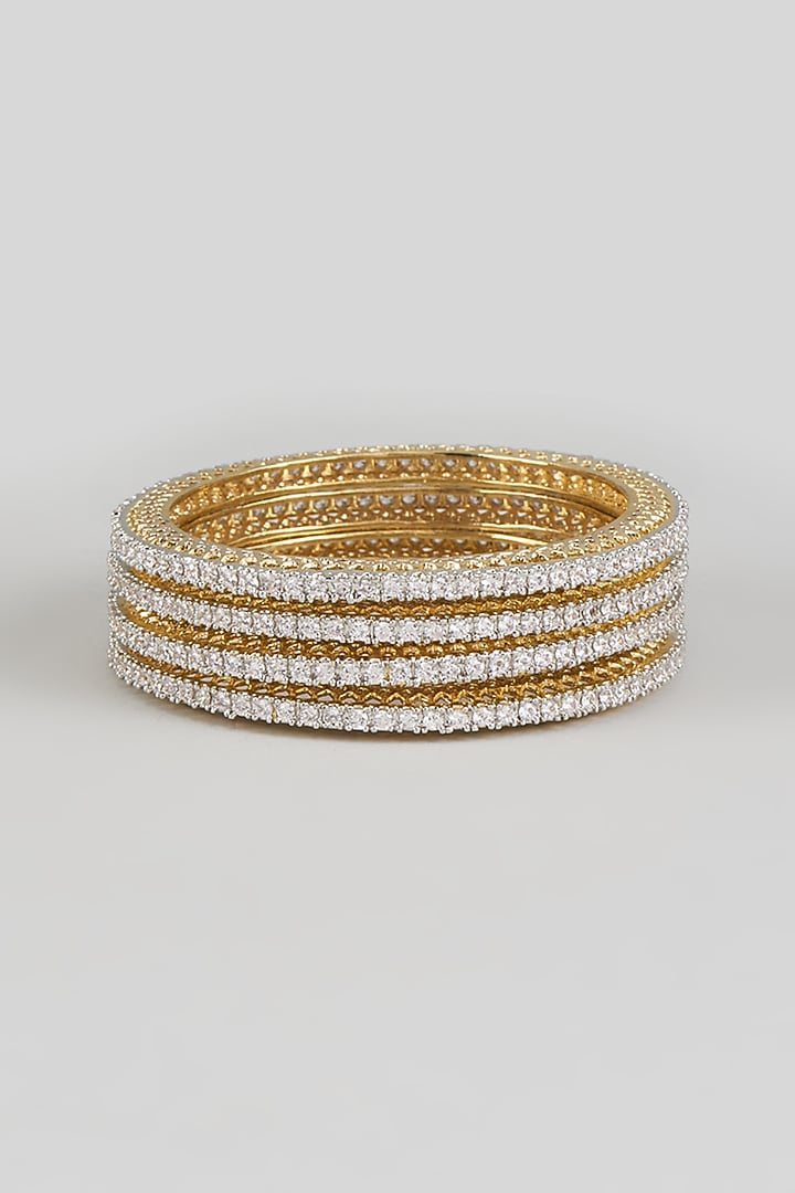 Gold Finish Zircon Bangles (Set Of 4) by Moh-Maya by Disha Khatri at Pernia's Pop Up Shop