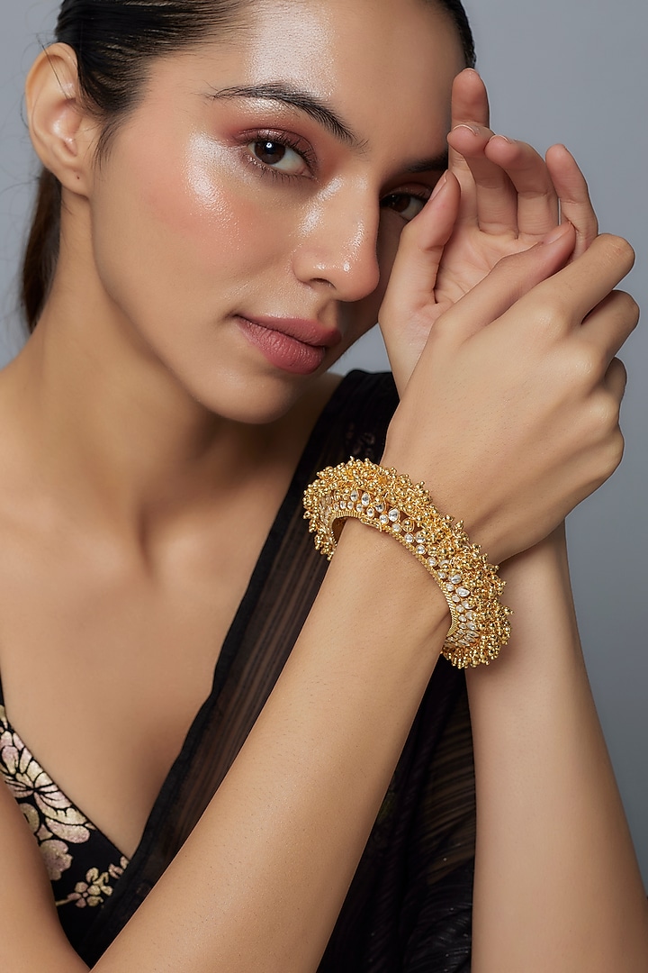 Gold Finish Kundan Polki & Beaded Bracelet by Moh-Maya by Disha Khatri at Pernia's Pop Up Shop