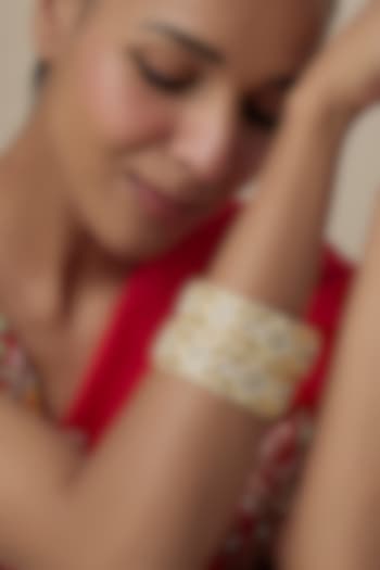 Gold Finish Kundan Polki & Pearl Bangles (Set Of 2) by Moh-Maya by Disha Khatri at Pernia's Pop Up Shop