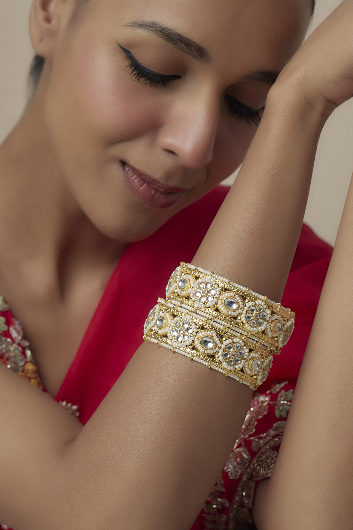 Gold Finish Kundan Polki & Pearl Bangles (Set Of 2) by Moh-Maya by Disha Khatri at Pernia's Pop Up Shop