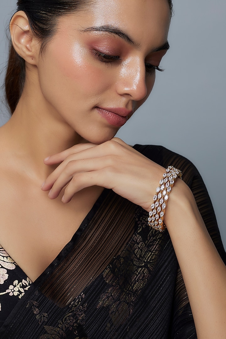 Gold Finish Zircon Bangles (Set Of 4) by Moh-Maya by Disha Khatri at Pernia's Pop Up Shop