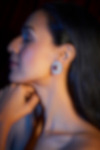 White Finish Ruby & Zircons Stud Earrings by Moh-Maya by Disha Khatri at Pernia's Pop Up Shop