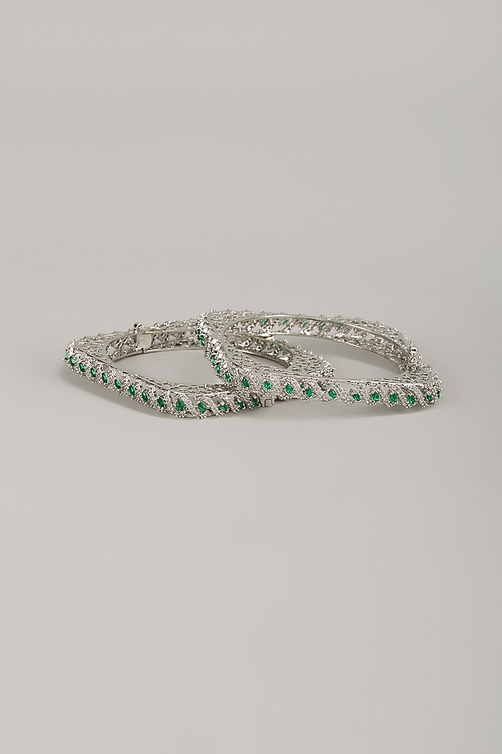 Silver Finish Emerald & Zircon Bangles (Set Of 2) by Moh-Maya by Disha Khatri at Pernia's Pop Up Shop