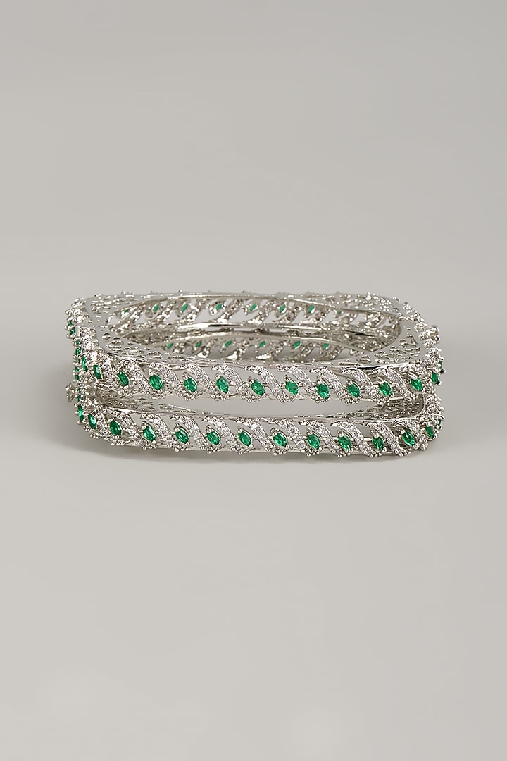 Silver Finish Emerald & Zircon Bangles (Set Of 2) by Moh-Maya by Disha Khatri at Pernia's Pop Up Shop