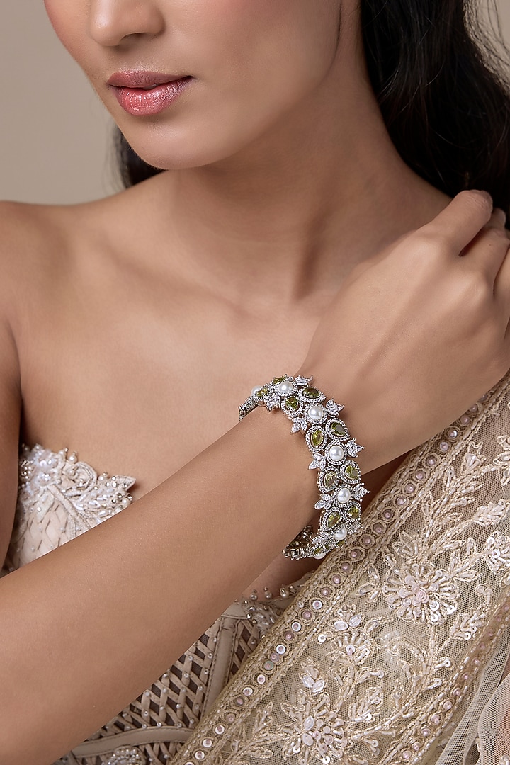 Silver Finish Zircon & Green Stone Bracelet by Moh-Maya by Disha Khatri at Pernia's Pop Up Shop