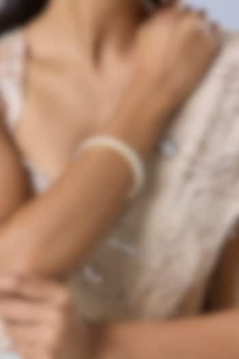 Gold Finish Pearl Bangles (Set Of 2) by Moh-Maya by Disha Khatri at Pernia's Pop Up Shop