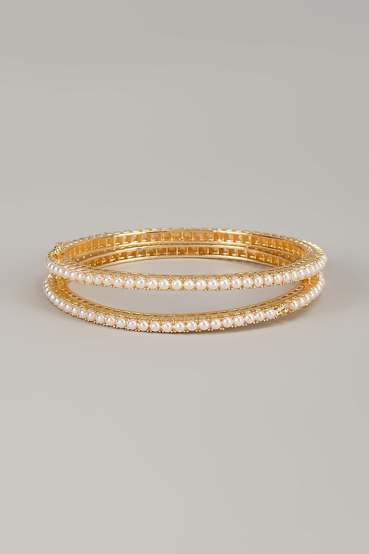 Gold Finish Pearl Bangles (Set Of 2) by Moh-Maya by Disha Khatri at Pernia's Pop Up Shop