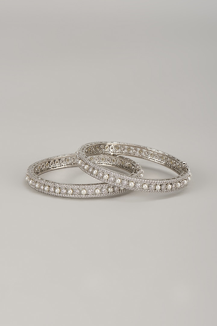 Silver Finish Zircon & Pearl Bangles (Set Of 2) by Moh-Maya by Disha Khatri at Pernia's Pop Up Shop