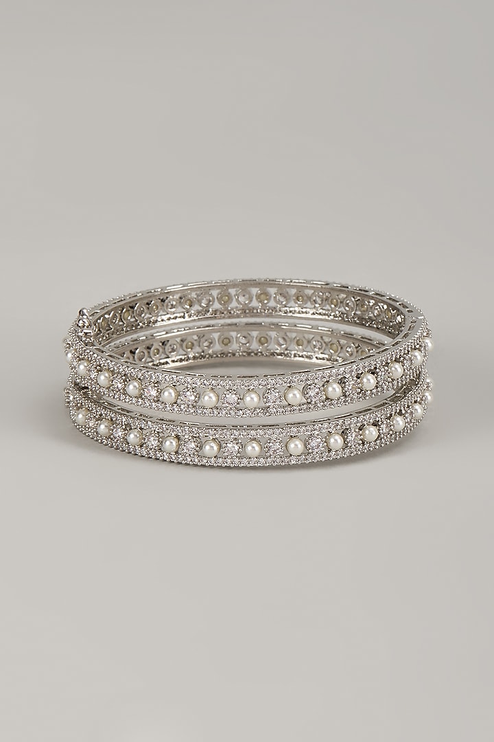 Silver Finish Zircon & Pearl Bangles (Set Of 2) by Moh-Maya by Disha Khatri at Pernia's Pop Up Shop