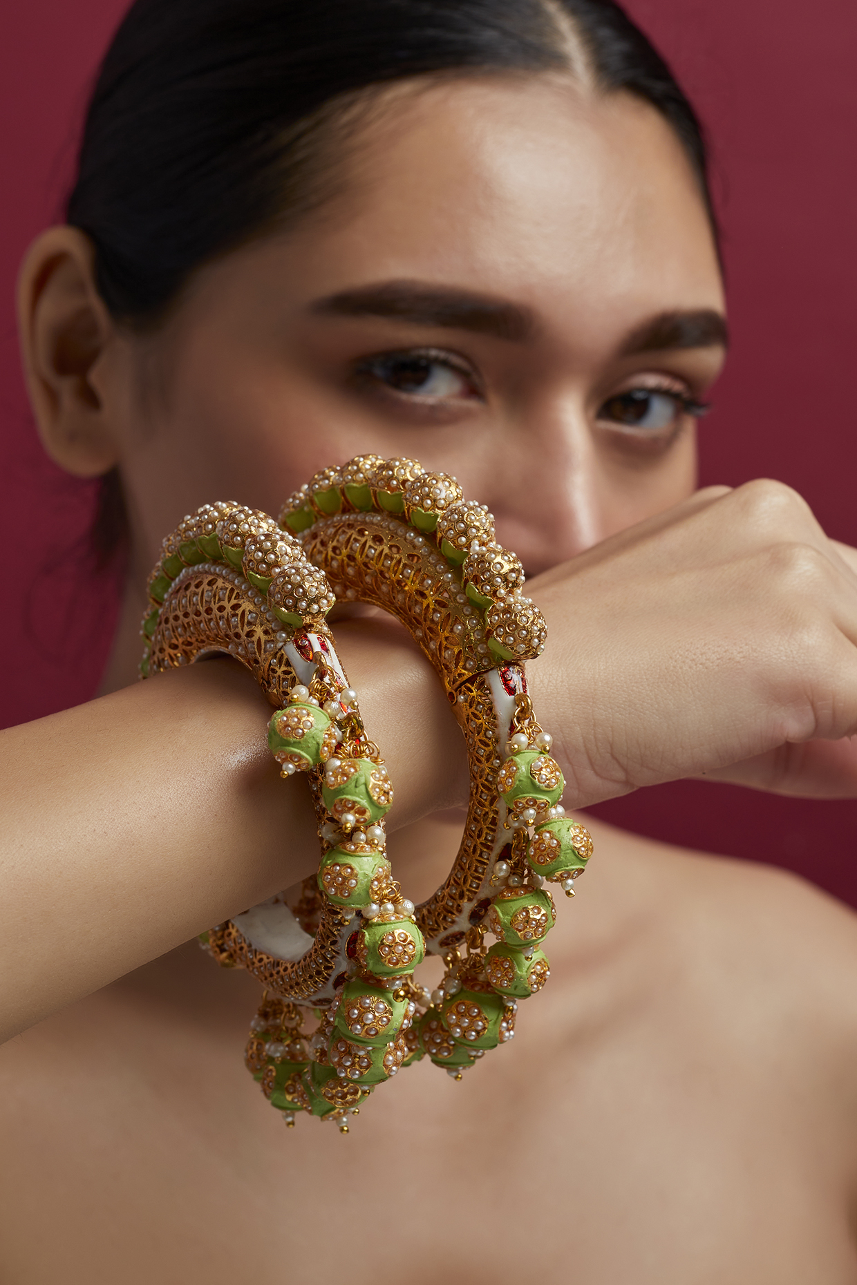 Gold Finish Green Meenakari Bangles (Set of 2) by Moh-Maya by Disha Khatri at Pernia's Pop Up Shop