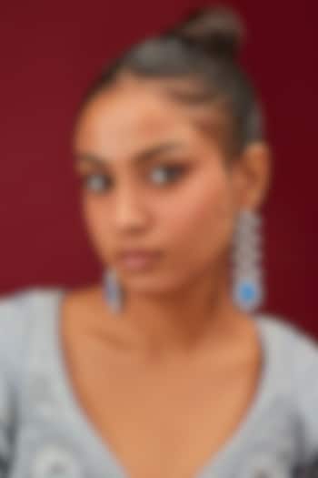 White Finish Zircon & Blue Stone Dangler Earrings by Moh-Maya by Disha Khatri at Pernia's Pop Up Shop