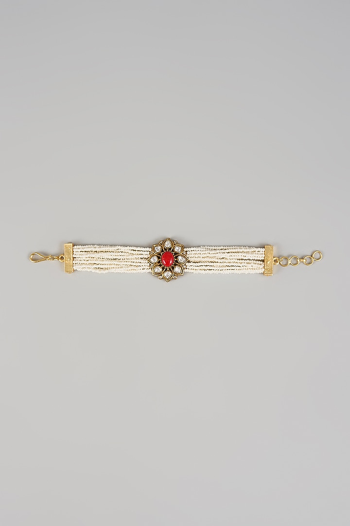 Gold Finish Ruby Stone & Pearl Bracelet by Moh-Maya by Disha Khatri at Pernia's Pop Up Shop