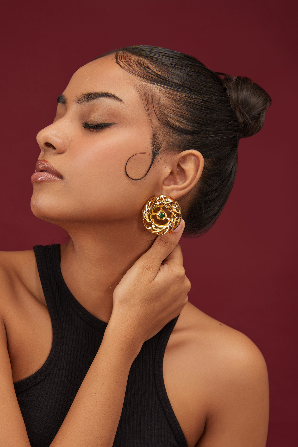 Gold Finish Zircon & Emerald Layered Stud Earrings by Moh-Maya by Disha Khatri at Pernia's Pop Up Shop