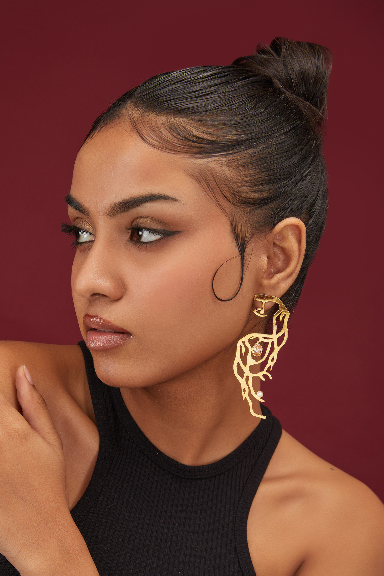 Gold Finish Zircon Abstract Shaped Dangler Earrings by Moh-Maya by Disha Khatri at Pernia's Pop Up Shop