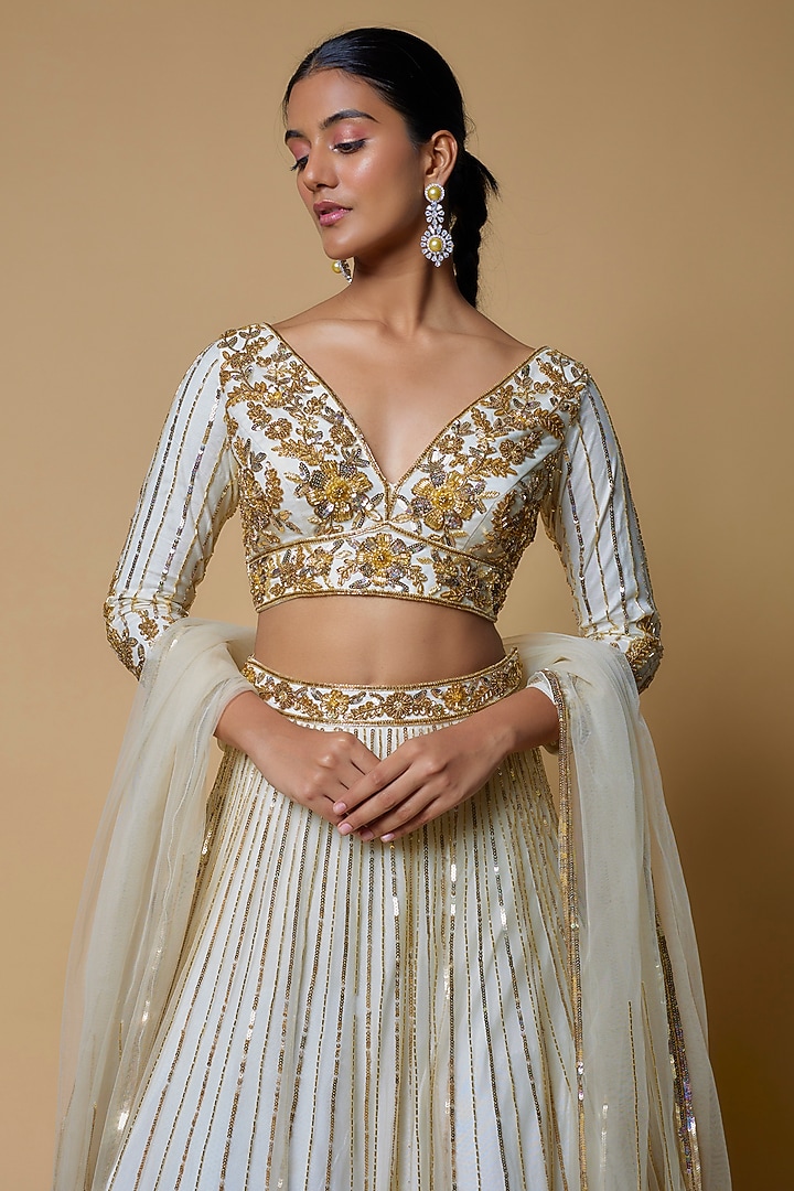Ivory & Gold Net Embroidered Bridal Lehenga Set by Mehak Murpana at Pernia's Pop Up Shop