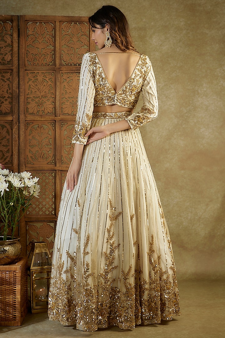 Ivory & Gold Net Embroidered Bridal Lehenga Set by Mehak Murpana at Pernia's Pop Up Shop