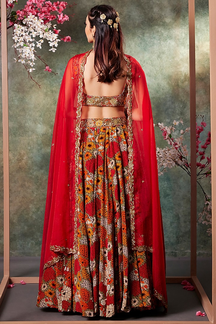 Orange Crepe Floral Printed & Gold Embroidered Wedding Lehenga Set by Mehak Murpana at Pernia's Pop Up Shop