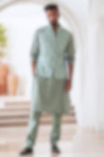 Green Net & Crepe Bundi Jacket Set by Mahima Mahajan Men