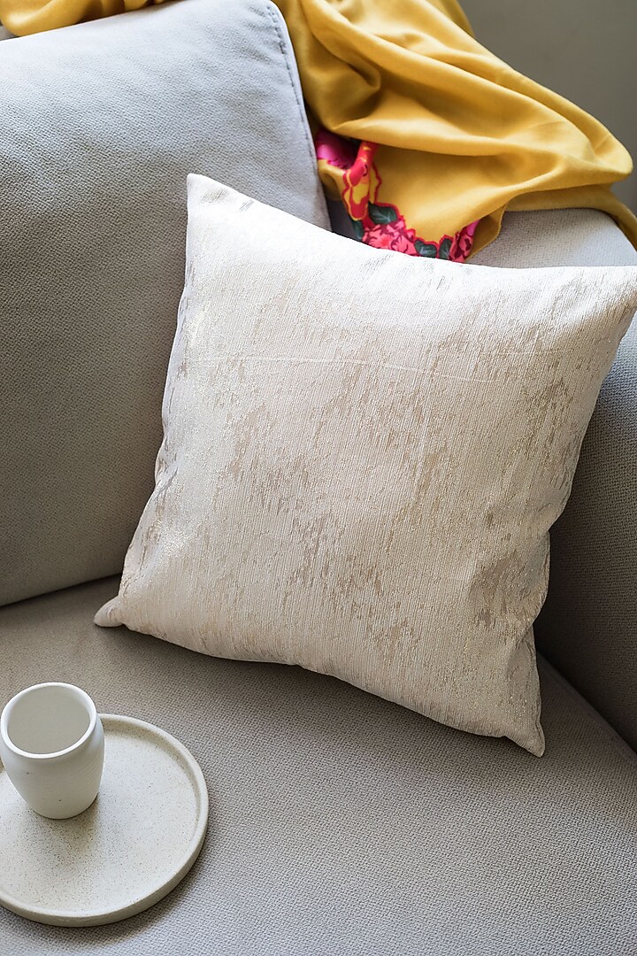 Cream Gold Shimmer Cushion by Chrysante By Gunjan Gupta at Pernia's Pop Up Shop