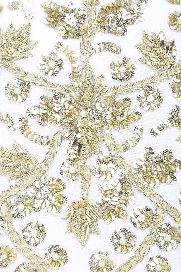 Ivory floral embroidered off shoulder blouse and lehenga skirt set available only at Pernia's Pop Up Shop.