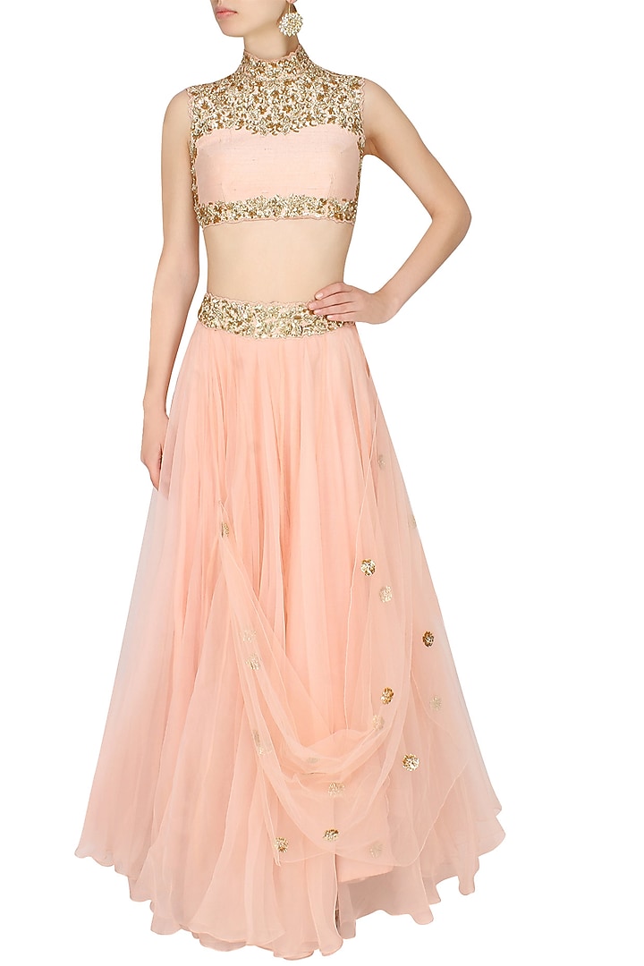 Pastel pink and gold floral embroidered blouse and lehenga set available only at Pernia's Pop Up Shop.