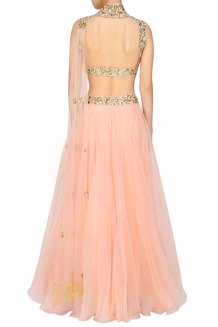 Pastel pink and gold floral embroidered blouse and lehenga set available only at Pernia's Pop Up Shop.