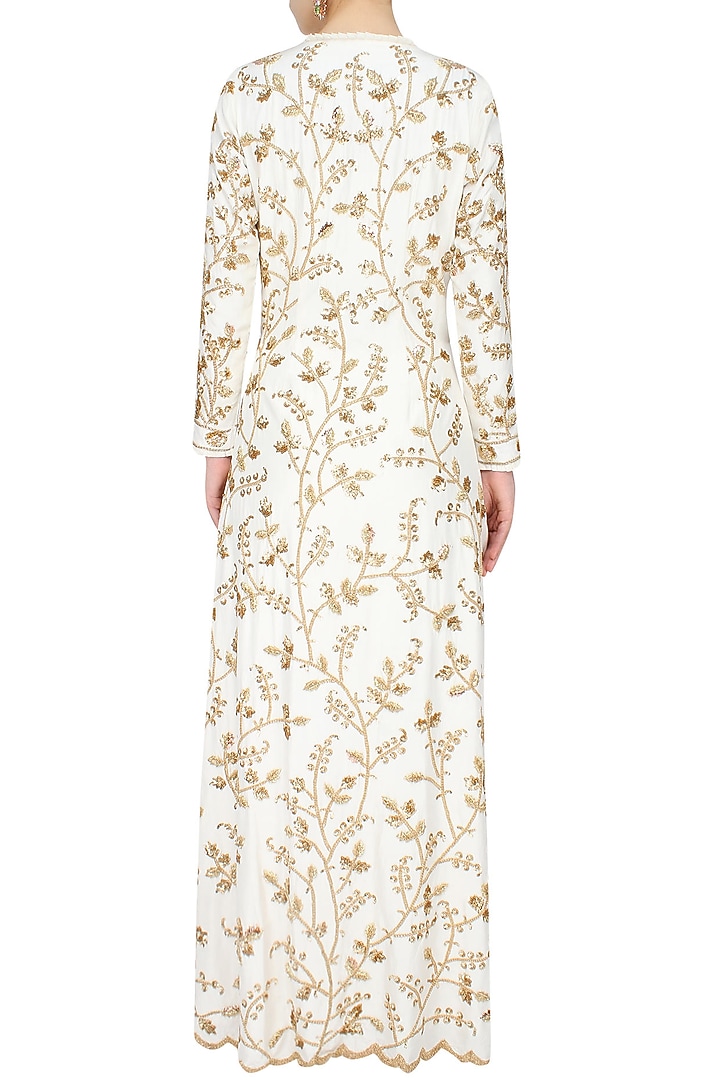 Ivory and gold floral embroidered jacket, bustier and dhoti skirt set available only at Pernia's Pop Up Shop.
